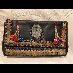 Handmade leather statement clutch